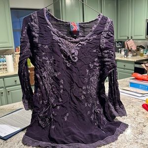 Johnny was purple tunic